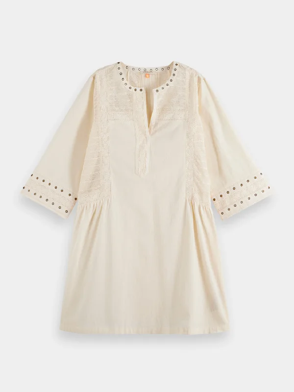 Short dress with eyelet detail